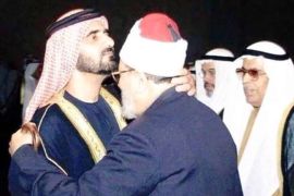 الشيخ محمد بن راشد يكرم الشيخ القرضاوي بعد نيله جائزة دبي
