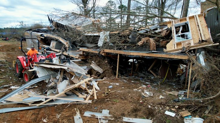 A view shows a home destroyed by a tornado in Deatsville, Alabama